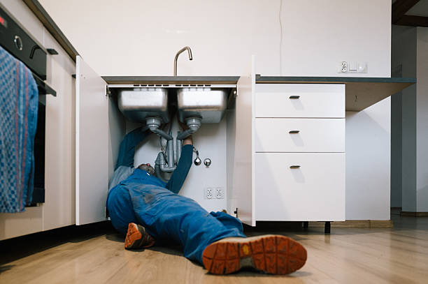 Professional Drain Cleaning technician working in Glen Cove, NY